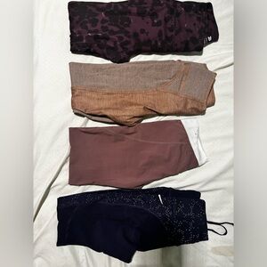 Three Nike pair and an all-in-motion leggings